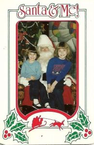 Talana Morris and sister Cindy with Santa.